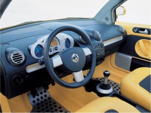 Volkswagen New Beetle Dune 2000 - dashboard with GPS navigation, spirit level, and compass